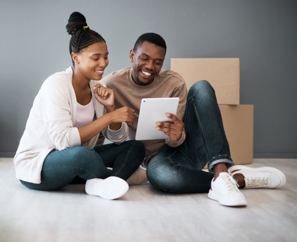 young black couple moving into new home